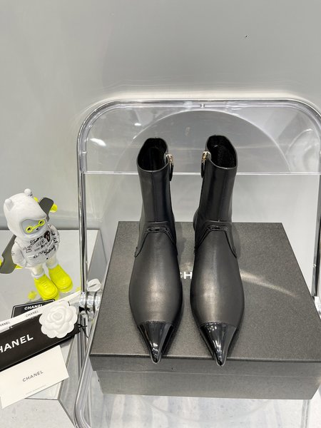 Chanel pointed toe high heel boots