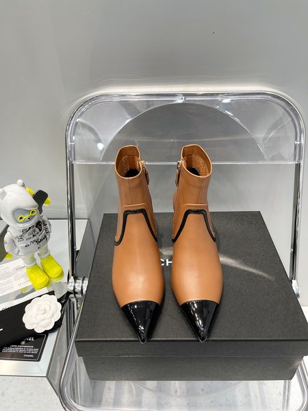 Chanel pointed toe high heel boots