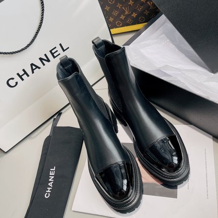 Chanel lace-up flat boots