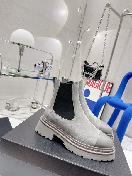 Chanel round toe chelsea ankle boots