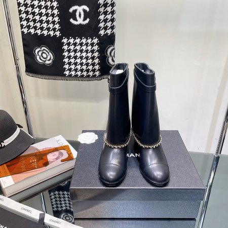 Chanel Mid-calf/tall boots with turned-up chain