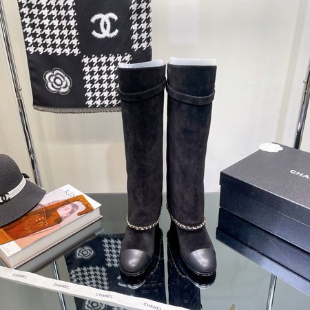 Chanel Mid-calf/tall boots with turned-up chain