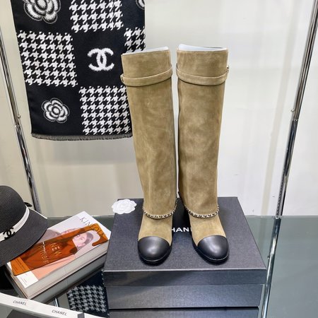 Chanel Mid-calf/tall boots with turned-up chain