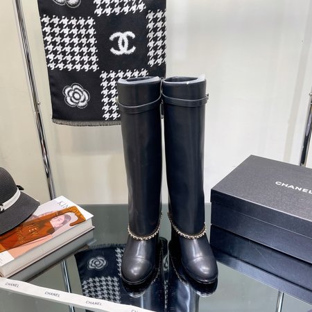 Chanel Mid-calf/tall boots with turned-up chain