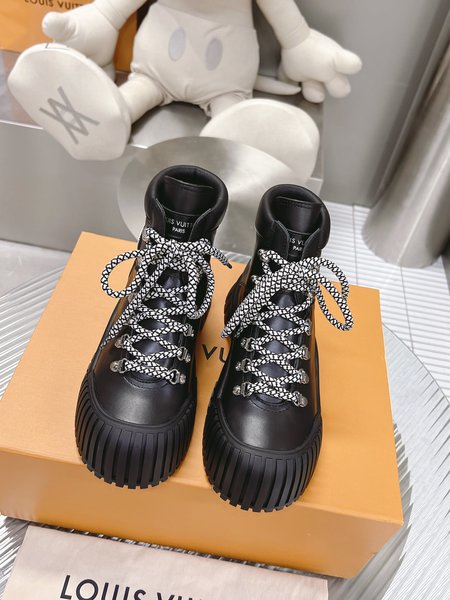 Louis Vuitton flat boots