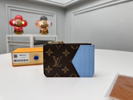 Louis Vuitton LV Romy Zipper Canvas Pocket Wallet M83602