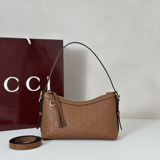 Gucci Brown Embossed Leather Handbag 847450