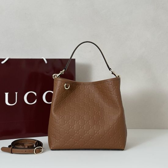 Gucci Brown Embossed Leather Handbag 815103
