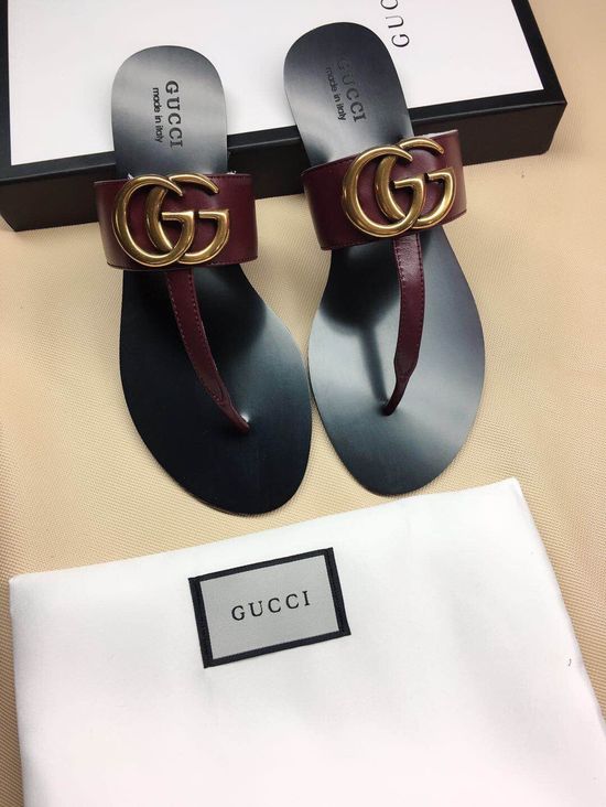 Gucci Cowhide Upper Flip Flops with Metal Decor