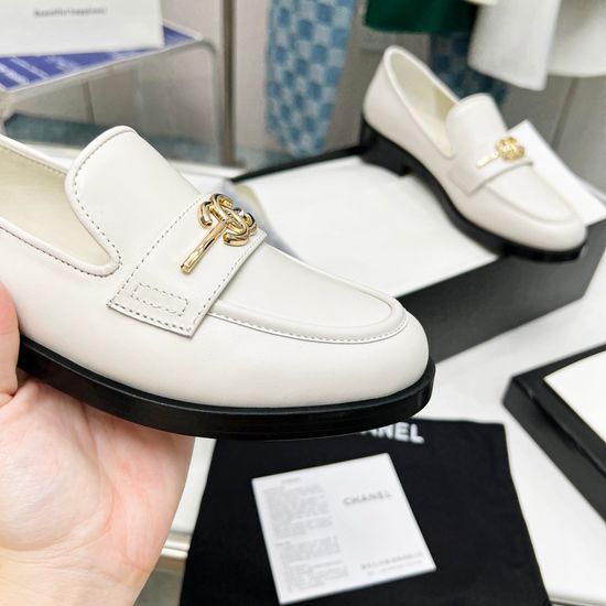 Chanel Comfortable Leather Loafers with Metal Logo Decor