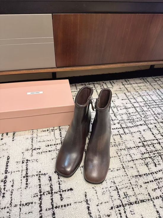 Miu Miu Classic Military-Style Ankle Boots with Smooth Leather