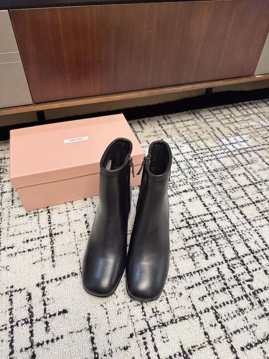 Miu Miu Classic Military-Style Ankle Boots with Smooth Leather