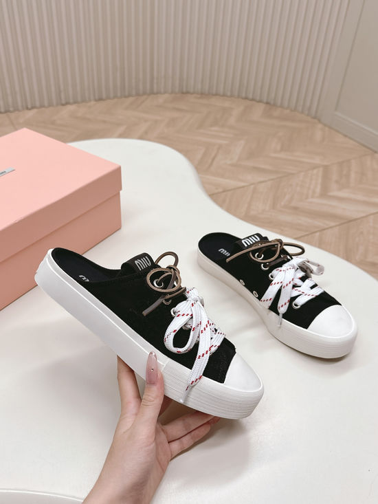 Miu Miu Casual Canvas Sneakers with Double Lace Design