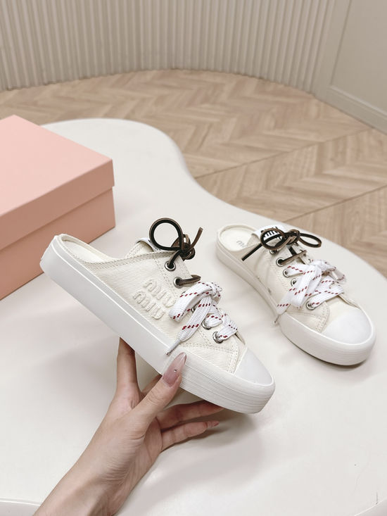 Miu Miu Casual Canvas Sneakers with Double Lace Design