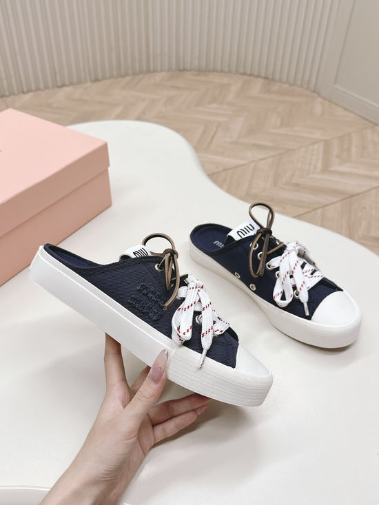 Miu Miu Casual Canvas Sneakers with Double Lace Design