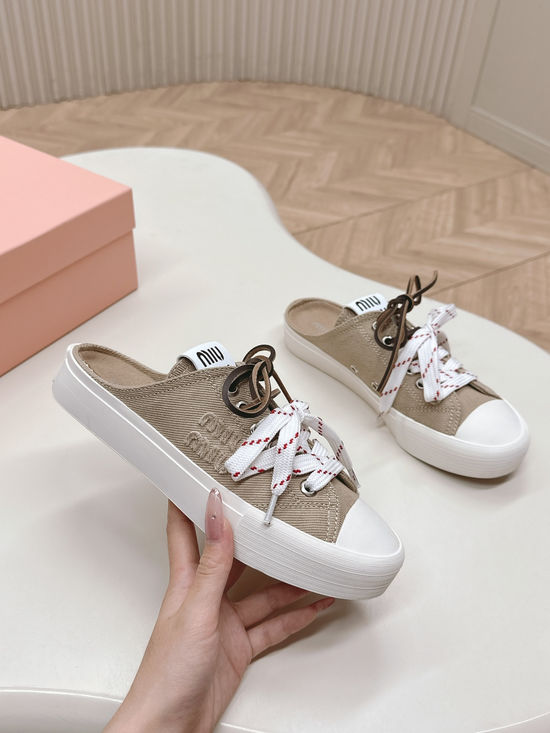 Miu Miu Casual Canvas Sneakers with Double Lace Design