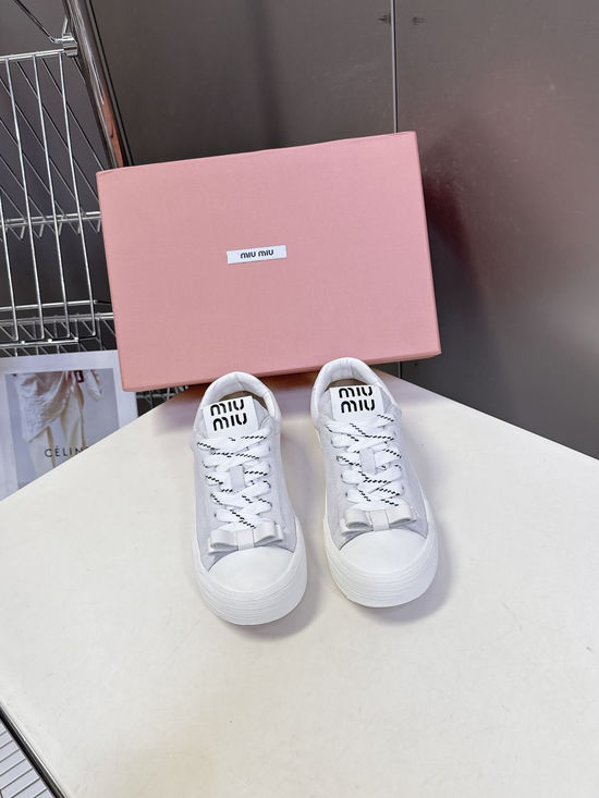 Miu Miu Bow Decorated Double Laces Vintage Leather Sneakers