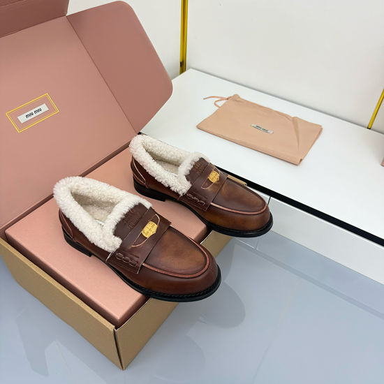 Miu Miu Vintage Distressed Leather Loafers for Casual Wear