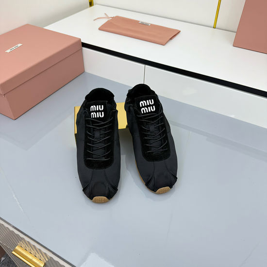Miu Miu Retro Rope-Sole Boat Shoes for Modern Style