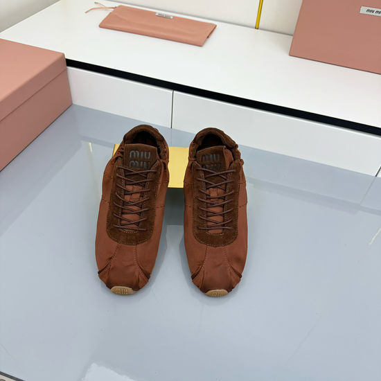 Miu Miu Retro Rope-Sole Boat Shoes for Modern Style