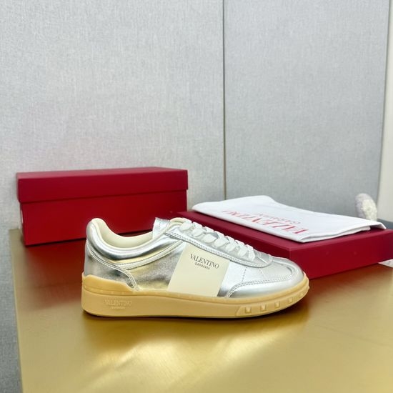 Valentino Studded Leather Lace-Up Sneakers with Punk Flair