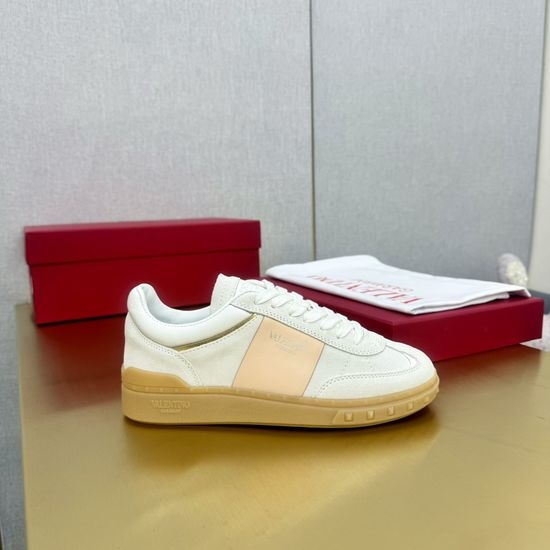Valentino Studded Leather Lace-Up Sneakers with Punk Flair