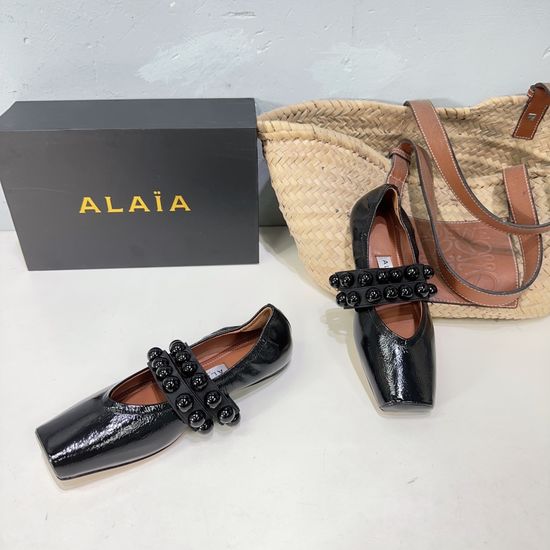 Alaia Buckle Decorated Round Toe Slip On Ballet Flats