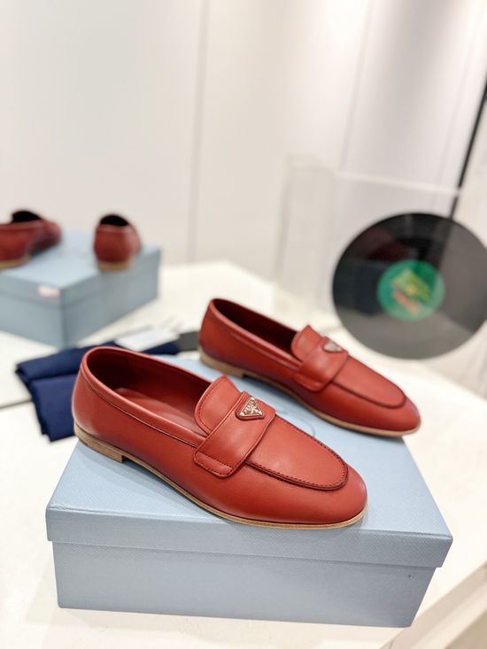 Prada Metal Logo Leather Comfortable Elevated Fashion Shoes