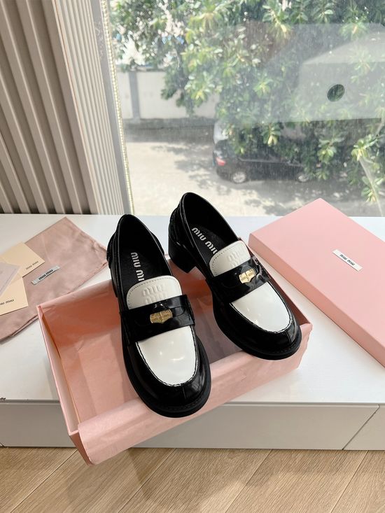 Miu Miu Vintage Distressed Leather Lace-up Loafers