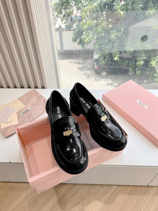 Miu Miu Vintage Distressed Leather Lace-up Loafers