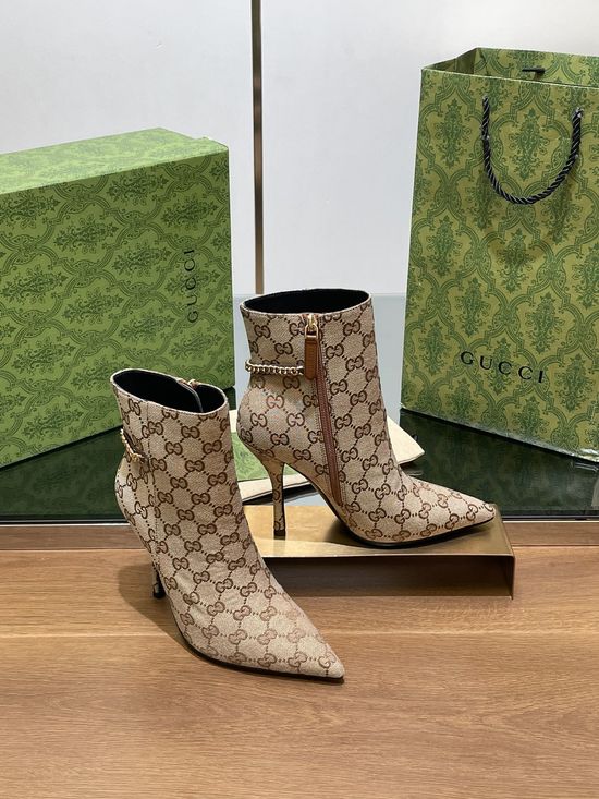 Gucci Pointed Toe Chain Ankle Boots With Monogram Upper