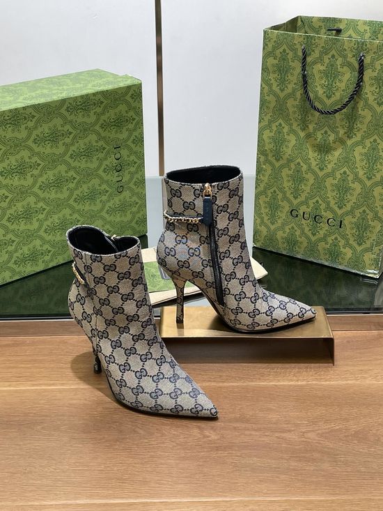Gucci Pointed Toe Chain Ankle Boots With Monogram Upper