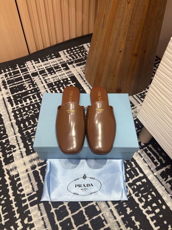Prada Patent Leather Round Toe Mules with Rubber Sole