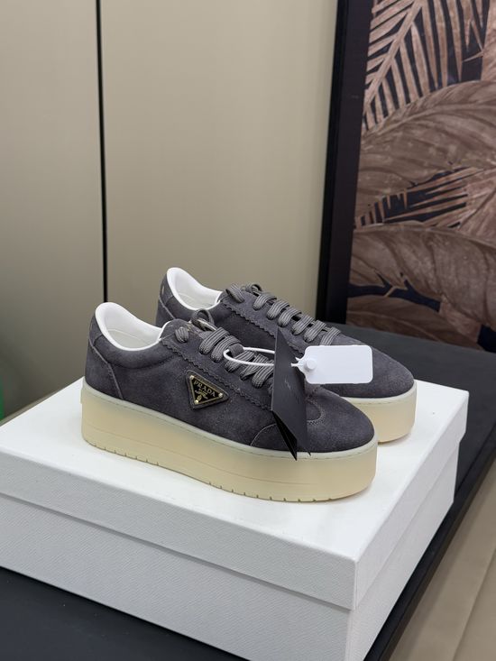 Prada Deconstructed Military-Inspired White Sneakers