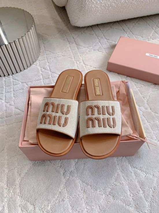 Miu Miu Casual Canvas Flat Slides with Minimalist Logo Design