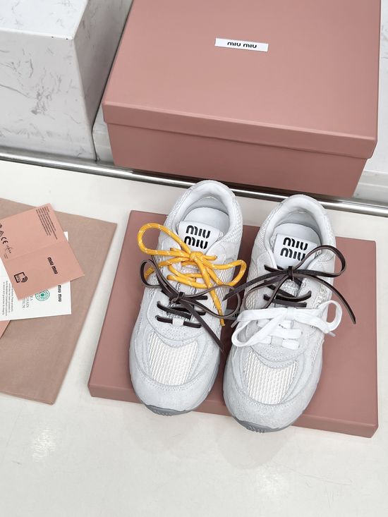 Miu Miu Vintage Distressed Chunky Sneakers with Dual Laces