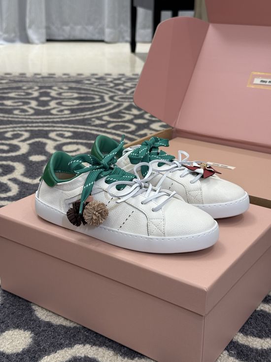 Miu Miu Cute Low Top Sneakers with Decorative Charm Details
