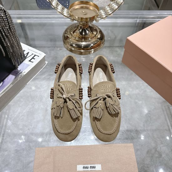 Miu Miu Chic Lace-Up Flat Moccasins with Tassels