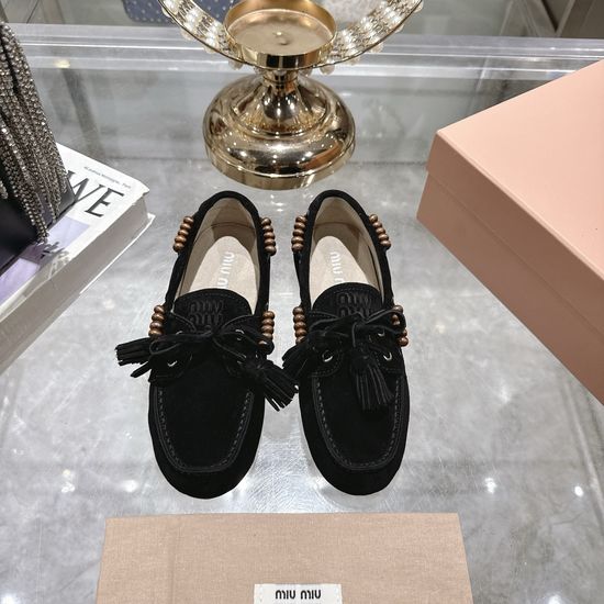 Miu Miu Chic Lace-Up Flat Moccasins with Tassels