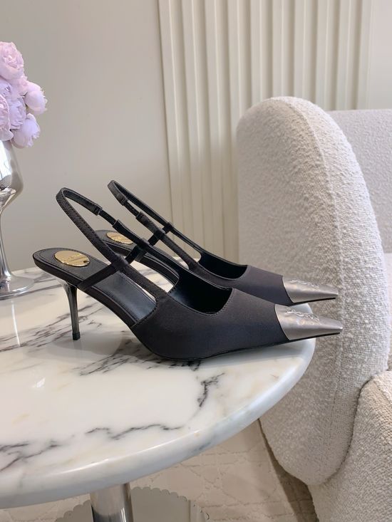 Yves Saint Laurent Elegant Pointed-Toe High Heels in Black and Silver