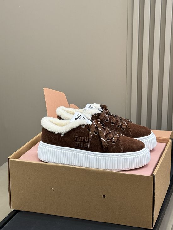 Miu Miu Luxurious Shearling-Lined Moccasin Boots
