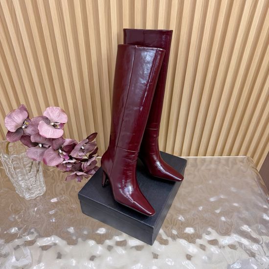 Yves Saint Laurent Elegant Side Zip Ankle Boots with Curved Design
