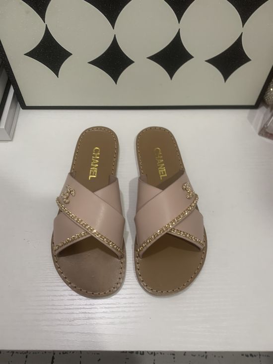 Chanel Genuine Leather Slip On Shoes with Metal Hardware