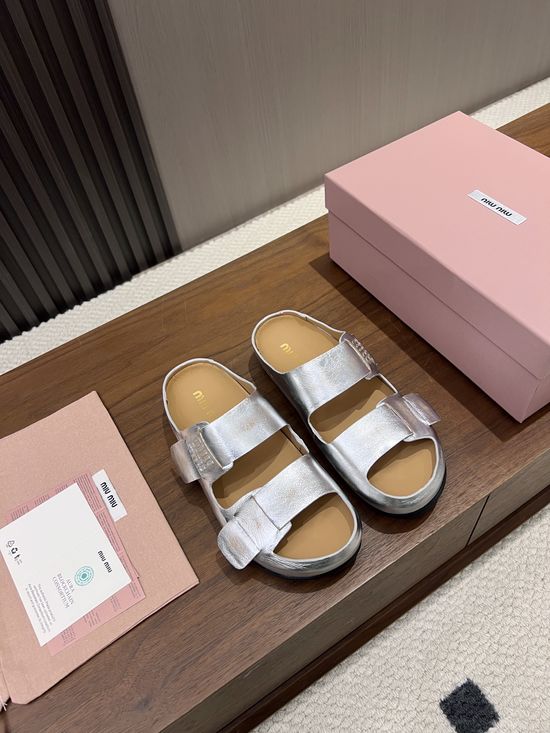 Miu Miu Hidden Lift Casual Clog Slippers With Embossed Logo