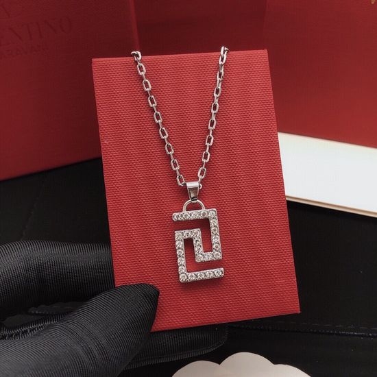Versace Silver Tone Crystal Accent Pendant Necklace